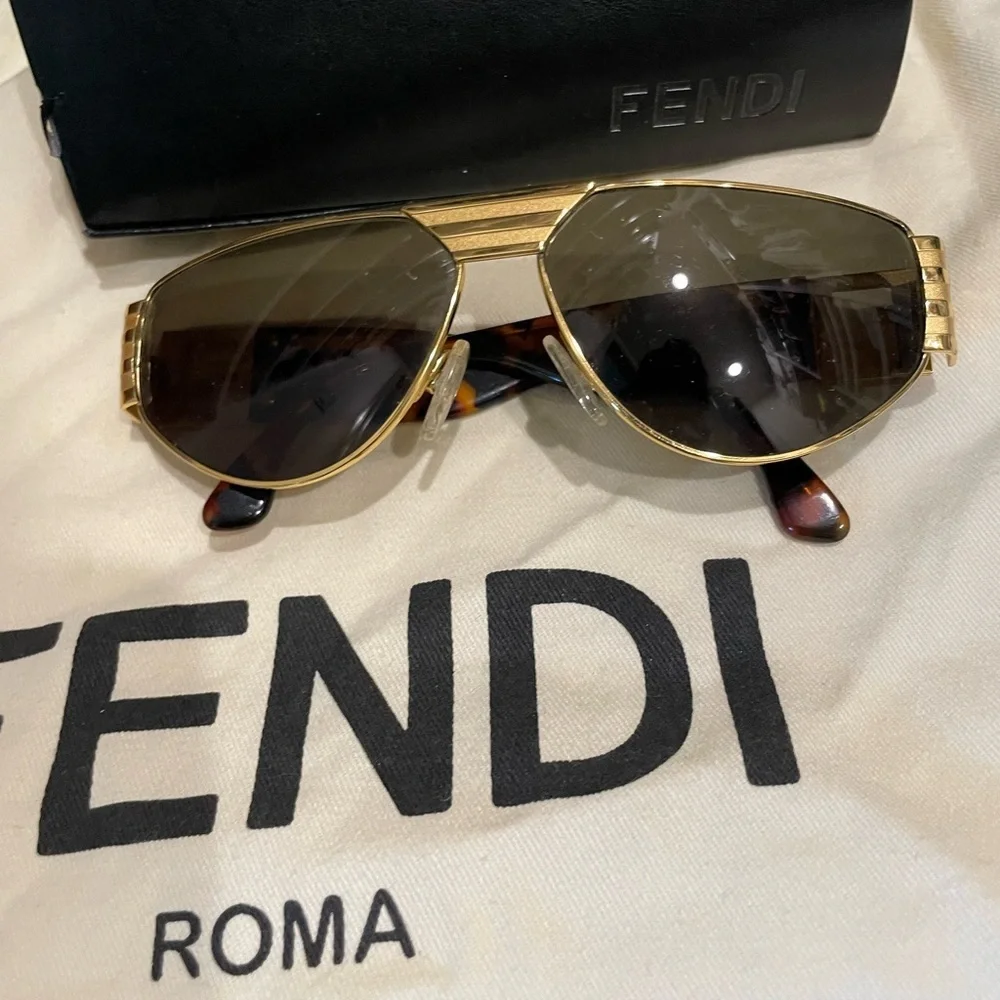 Fendi unisex Sunglasses with Gold Frame and Dark Lenses